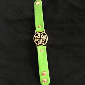 Fake leather bracelet with gold design